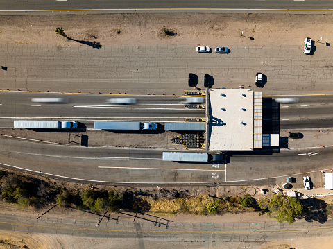 Drone shot looking straight down on the Agricultural Inspection Station on the California/Arizona state line in Blythe, CA.