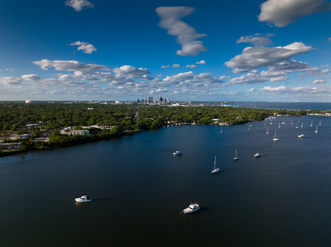 Drone shot taken from over sailboats in Tampa Bay on a sunny spring day, with the skyline of St Petersburg in the distance. 

This still image is part of a series; a time lapse video is also available. 

Authorization was obtained from the FAA for this operation in restricted airspace.