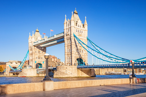 The landmark Tower Bridge in London England UK on a sunny day.