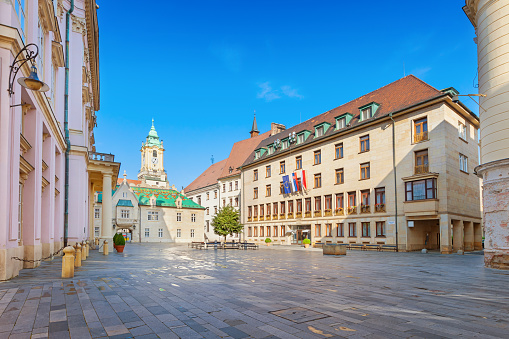 Town square with the old and new city halls in old town Bratislava, Slovakia.