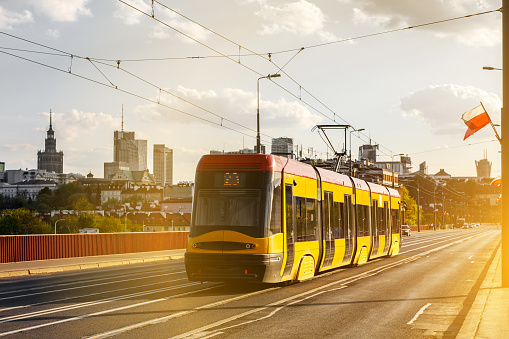 Tram in the city. Moderm public transport concept. Warsaw, Poland