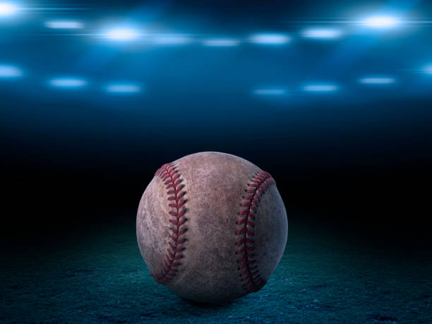 istock Sport stadium with baseball ball at night backdrop. for background advertisement 1395048992