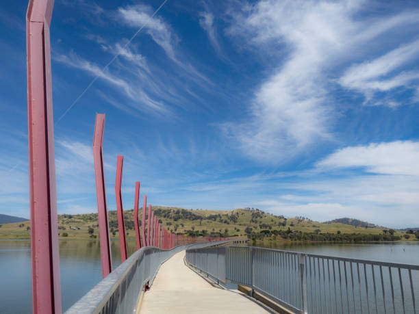 istock Bike trail bridge over lake 1395049126
