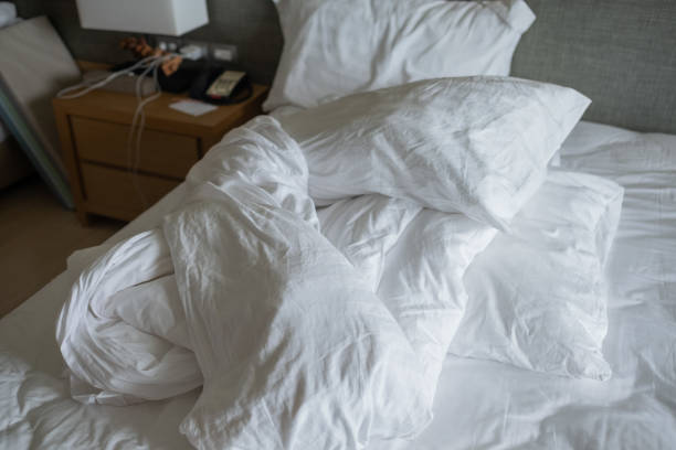 istock white bed background, after sleep, dirty bed 1395054613