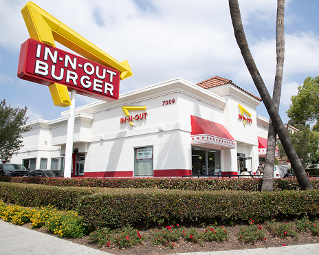 Los Angeles, CA, USA - May 2, 2022: Exterior of an IN-N-OUT BURGER restaurant on Sunset Boulevard in Los Angeles, CA.