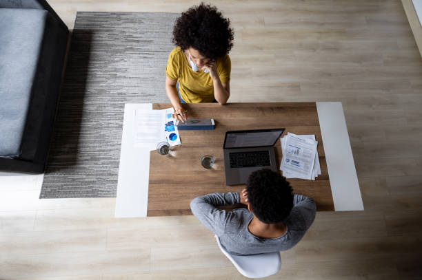 istock Couple of freelance workers working at home 1395058290