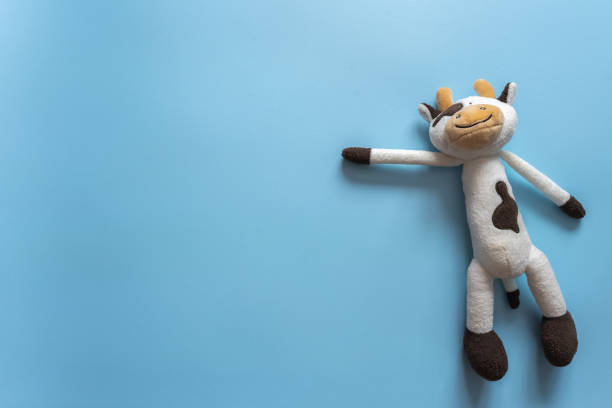istock kid's toy on the blue background close up 1395072327