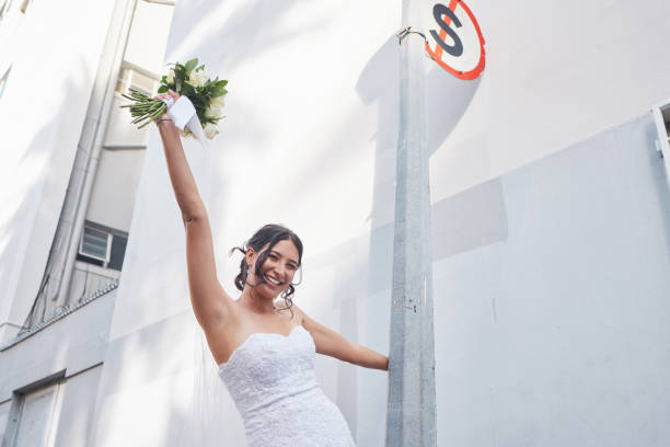 istock Shot of a beautiful bride standing outside 1395078494
