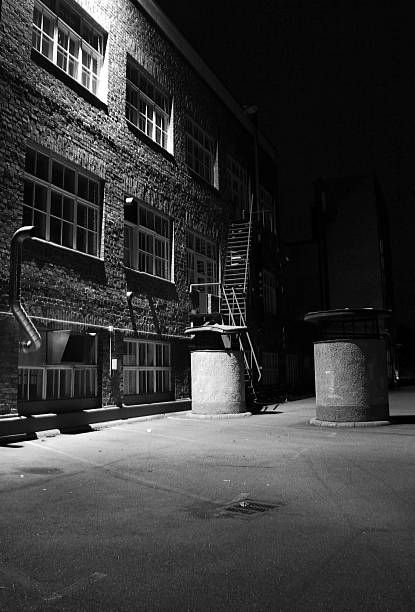 istock Dark alley, factory backyard, black and white 139508202