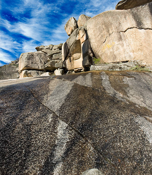 Rockscape granite mountain landscape cloud sky stock photo