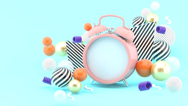 istock Clock surrounded by colorful balls on a blue background.-3d rendering. 1395087774