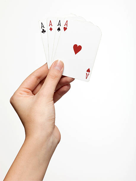 full ace in female hand stock photo