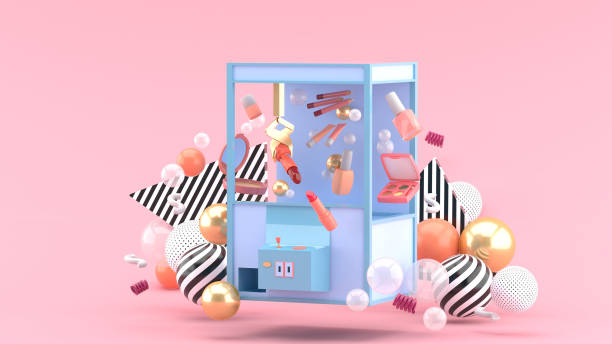 istock cosmetic catcher machine amid colorful balls on a pink background.-3d rendering. 1395087895