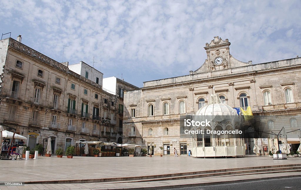 Square in Ostuni One of the historic old piazzas in southern Italian town of Ostuni Cafe Stock Photo