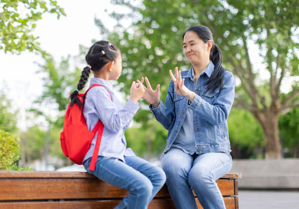 istock Mother and daughter playing games 1395089615