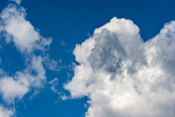 istock Beautiful Cumulus Clouds on Clear Blue Sky - Photography Full Frame 1395090308