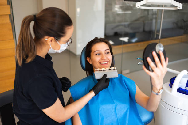 istock Choosing a shade of dental veneers 1395093231