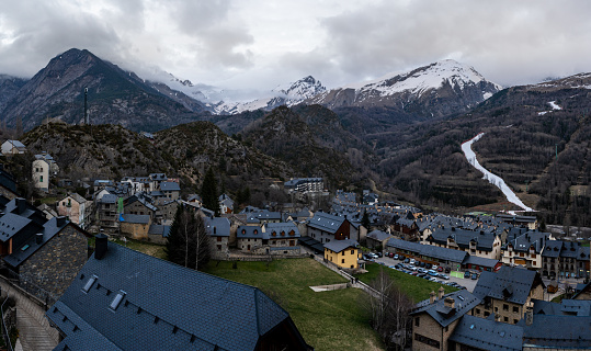 Panoramic view of Panticosa, skiing town at evening, surrounded by Pyrenees snowy mountains, Spain. Travel destination