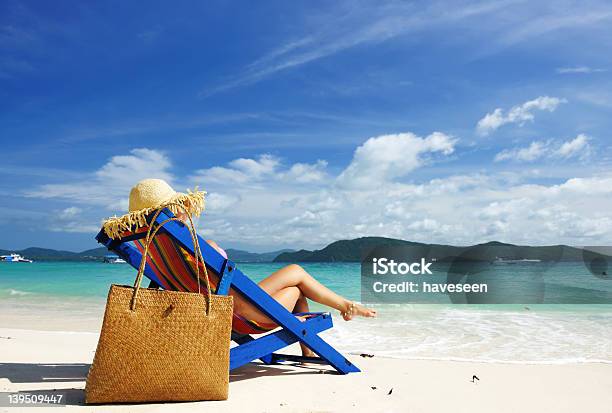 Girl On A Beach Stock Photo - Download Image Now - Flip-Flop, Hat, Summer