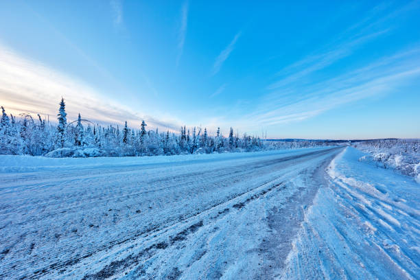 istock Winter Highway, Alaska, USA 1395095436