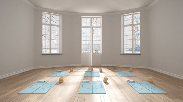 istock Empty yoga studio interior design, minimal classic space, parquet floor, walls with stucco, mats and accessories, ready for yoga practice, meditation, panoramic window, winter view 1395097014