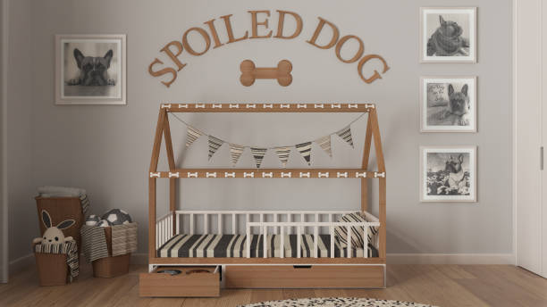 dog room interior design, cozy space devoted to pets in white and wooden tones. wooden dog bed with pillow and drawer with treat bowl. baskets with towels and toys, frames - treated wood imagens e fotografias de stock