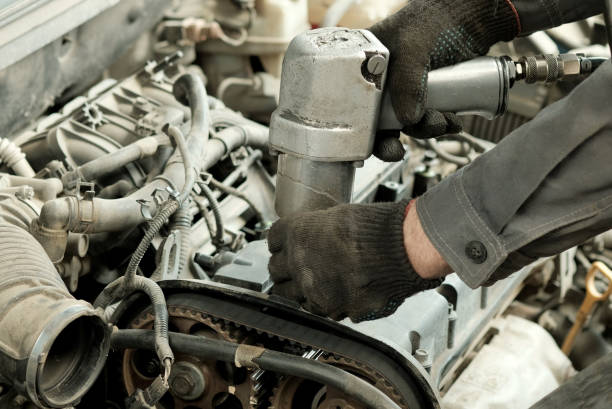 istock Car engine repair in a car service center. 1395099850