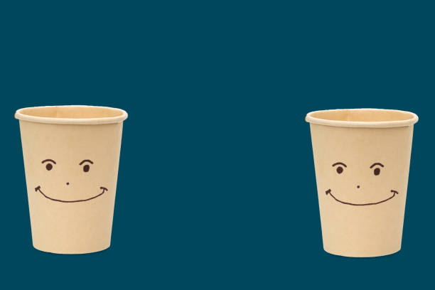 istock Disposable brown craft paper cup isolated. 1395105282