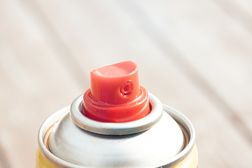 Spray Can Nozzle. Macro photo with shallow depth of field. Close up.