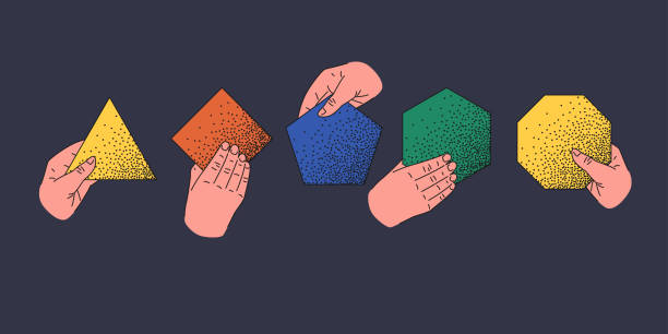 istock Human hands hold various geometric flat shapes. A set of isolated objects on a dark background. 1395107347