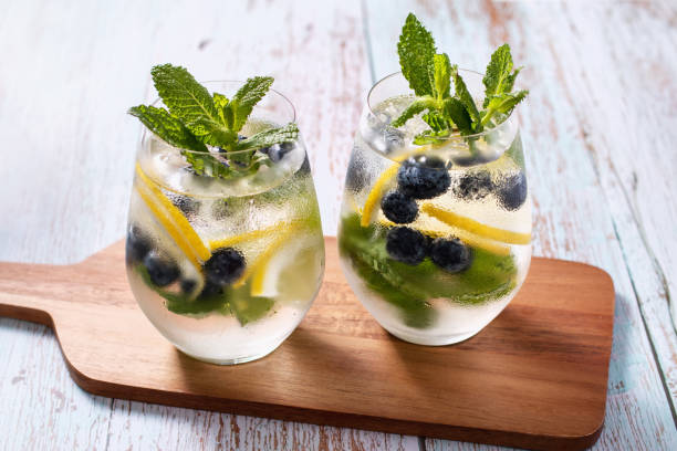 istock Blackberry and lemon refreshing summer cocktail with berries and citrus fruit 1395108210