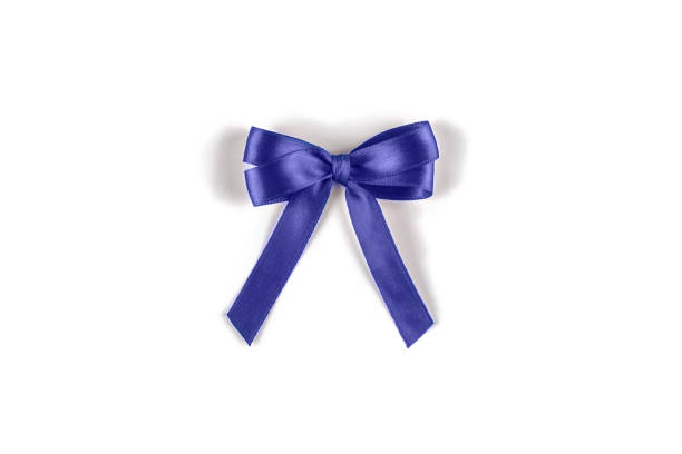 istock Very peri silk gift bow isolated on white. 1395110058