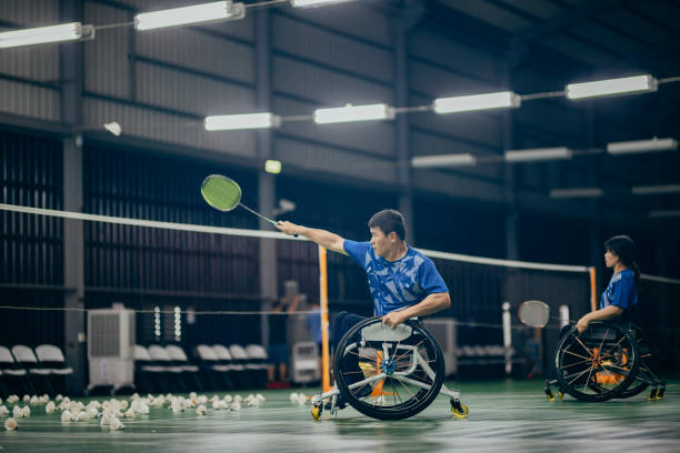 istock Enjoy life - Asian handicapped people training badminton 1395112548