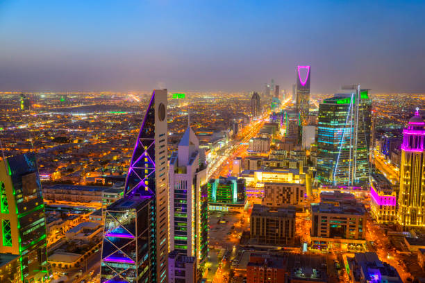 Riyadh illuminated city skyline at twilight Elevated view over Riyadh. Saudi Arabian capital city at night. saudi arabia stock pictures, royalty-free photos & images