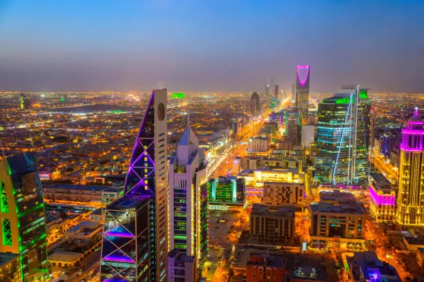 Photo of Riyadh illuminated city skyline at twilight