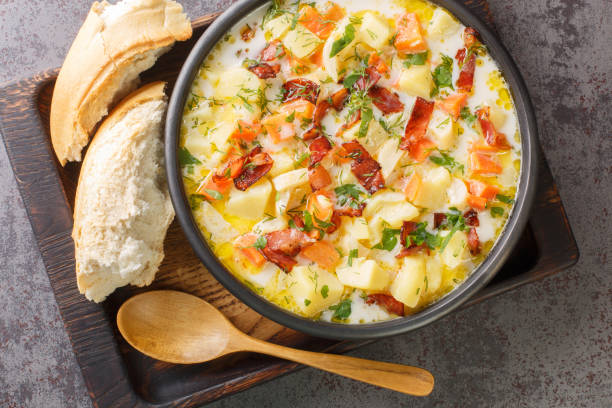 istock Potato spicy soup with crispy bacon close-up in a plate. horizontal top view 1395114008