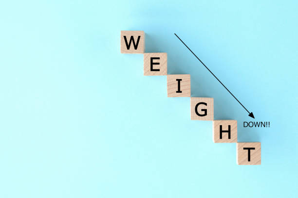 Wooden blocks with "WEIGHT" word, diet images stock photo