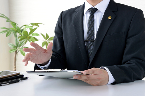 Japanese male lawyer working in office