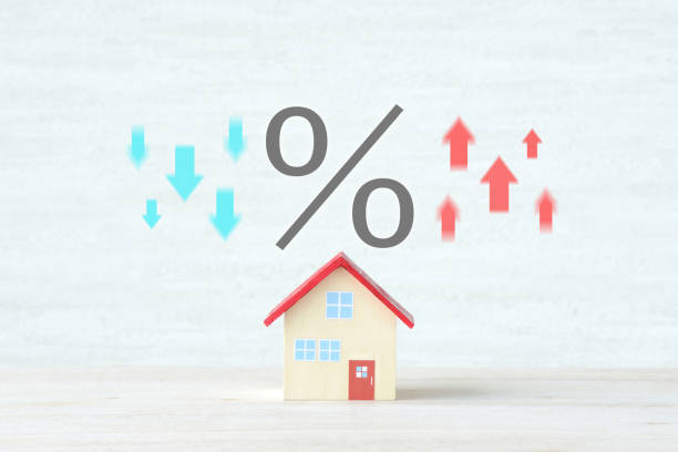 House object and percentage sign with upward and downward arrows House object and percentage sign with upward and downward arrows simple living stock pictures, royalty-free photos & images