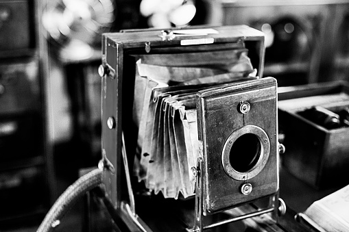 vintage old film camera on wood board with copy space