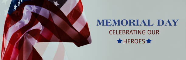 istock text memorial day, celebrating our heroes, banner 1395117297