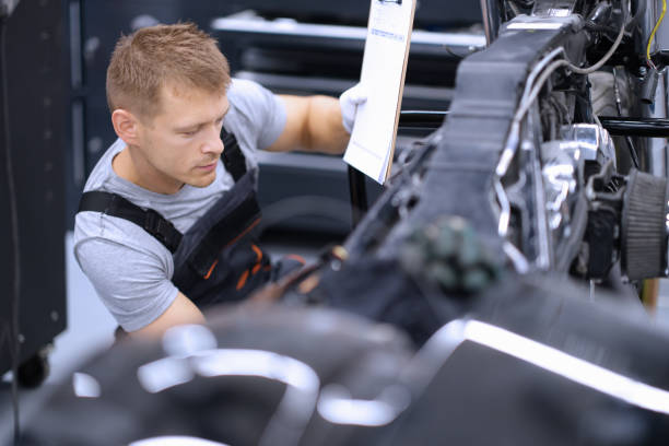 istock Concentrated male mechanic work with tool, fix damaged motorbike at workshop 1395120748
