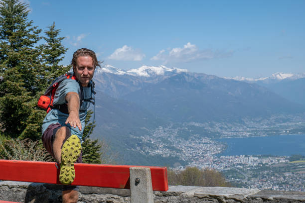 istock Trail runner prepares for morning run 1395121226
