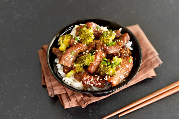 istock Beef and broccoli stir fry with rice 1395122265