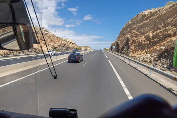 Highway going north south through the volcanic landscape of the Spanish Canary island Tenerife connecting the main city Santa Cruz in the north with the international airport and the tourist areas in the south