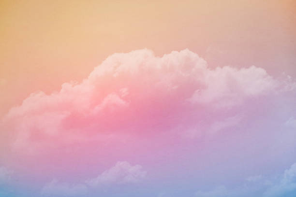 istock blurred fluffy cloudy sky with pastel gradient color and grunge texture for nature abstract background 1395123720