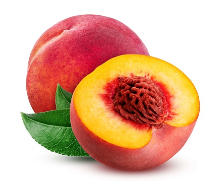 Photo of large juicy ripe sweet orange-pink peaches at the market