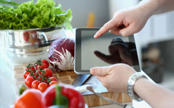 Vlogger chef showing ripe vegetables ingredients, video for culinary vlog