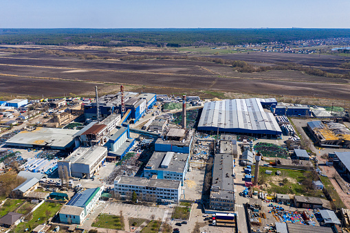 Top view of the destroyed glass factory. The glass factory was destroyed by a rocket or mine from Russian soldiers. Cities of Ukraine after the Russian occupation.