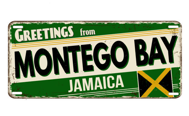 bildbanksillustrationer, clip art samt tecknat material och ikoner med greetings from montego bay vintage rusty metal plate - welcome to jamaica